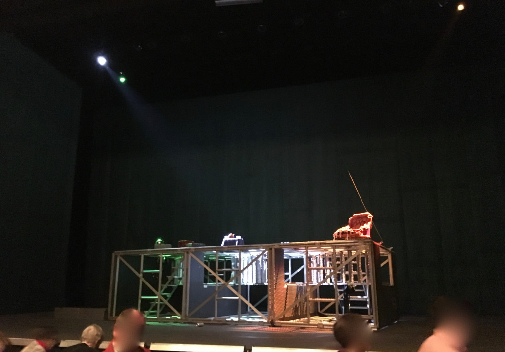 Act 4 set (the tower of scaffolding has fallen). My own illicit snapshot. All the production photos are awful, completely misrepresenting the spaciousness of the set.